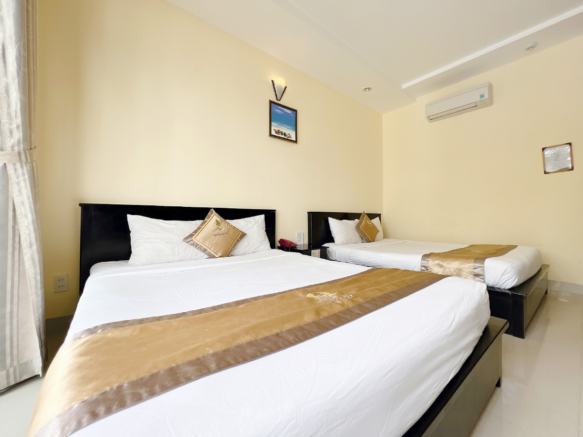 Standard Quadruple Room HÒN RƠM CENTRAL BEACH RESORT